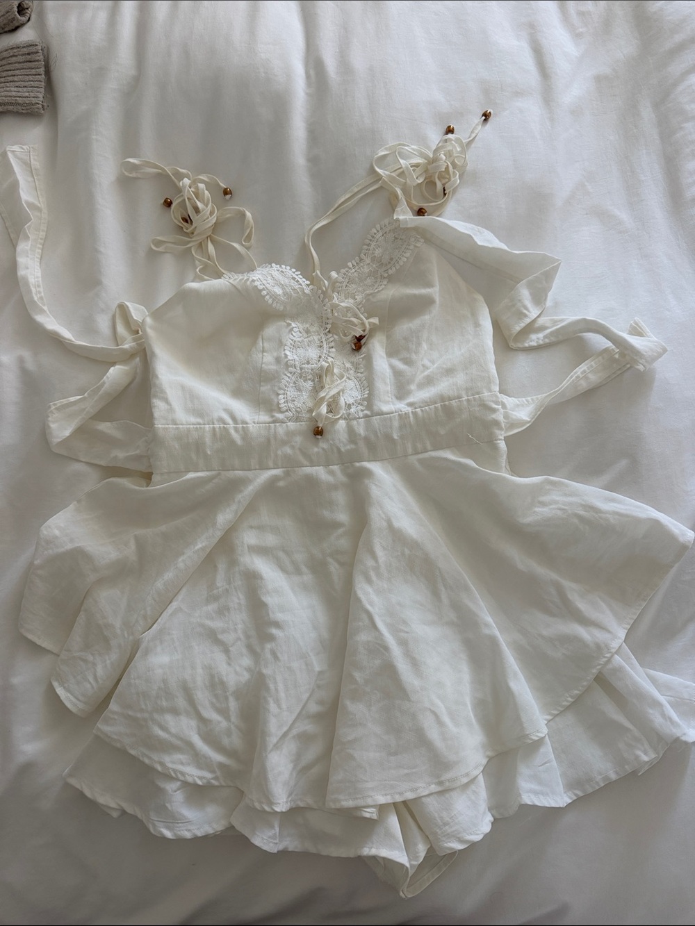 HYFVE White Ruffle Romper Dress with Tie Straps